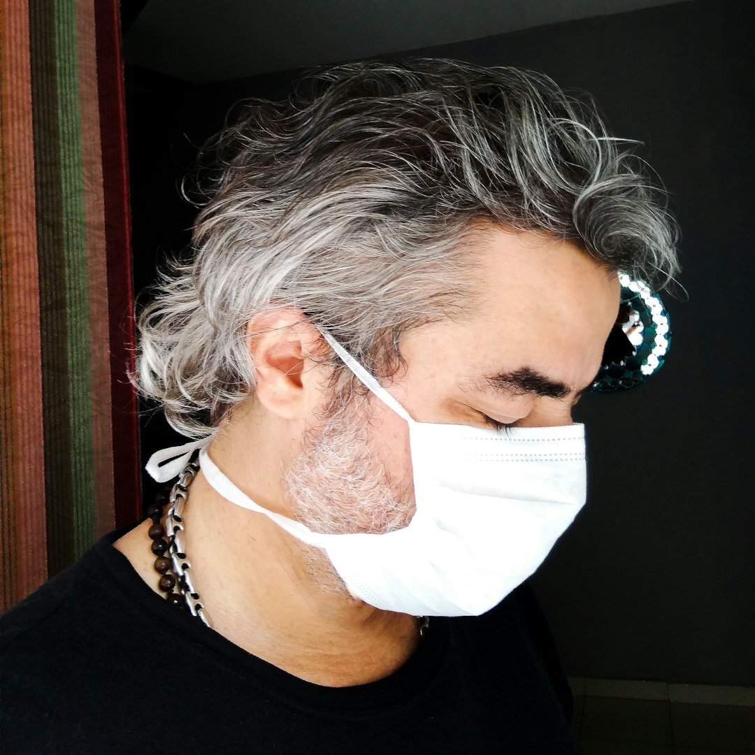 Studio portrait of a Swiss man in his fifties, television historian