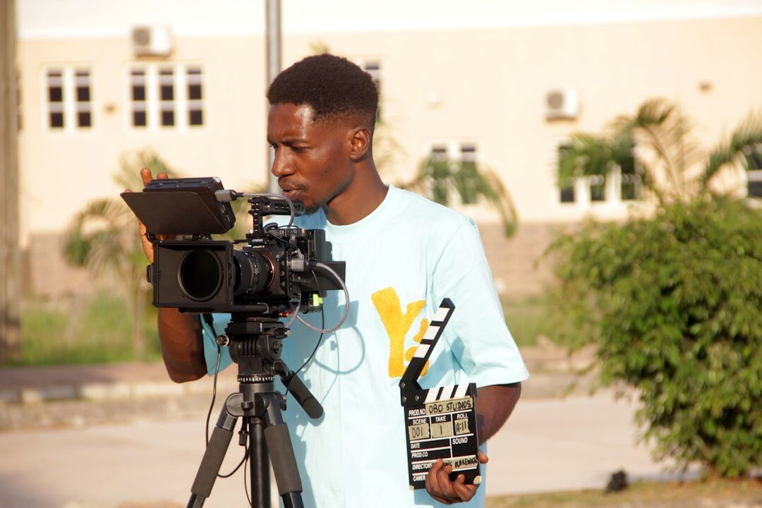 Camera operator filming inside a television studio