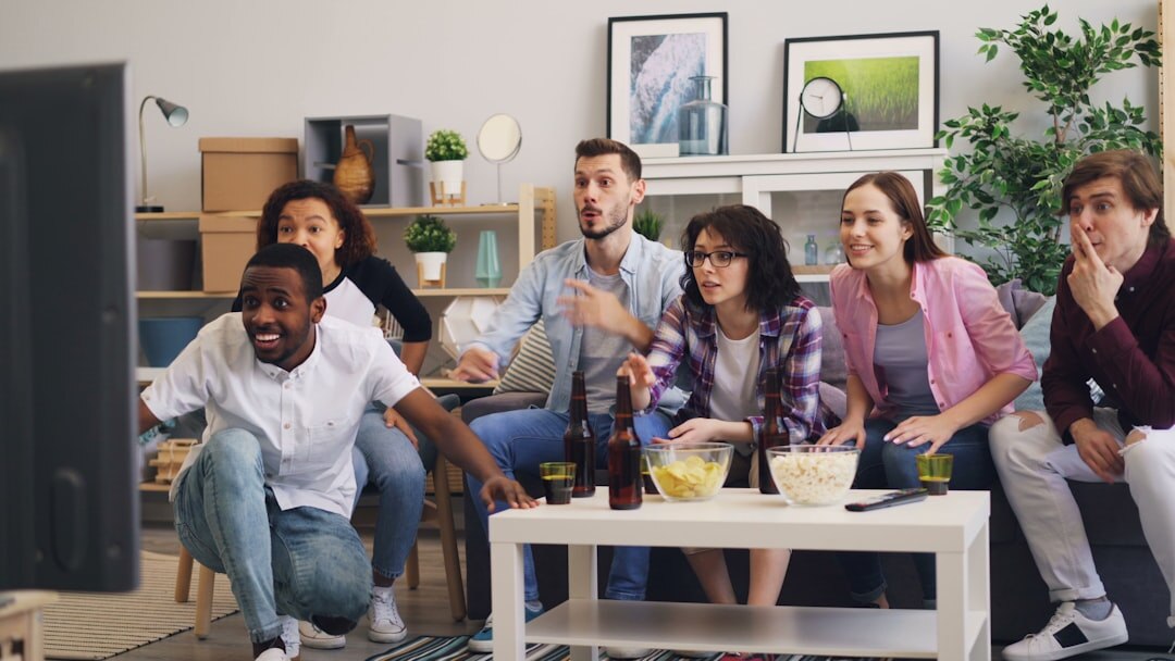 group watching television